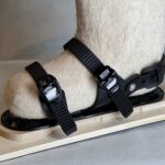 Wool boot in three strap ski binding