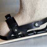 Wool boot in two strap ski binding